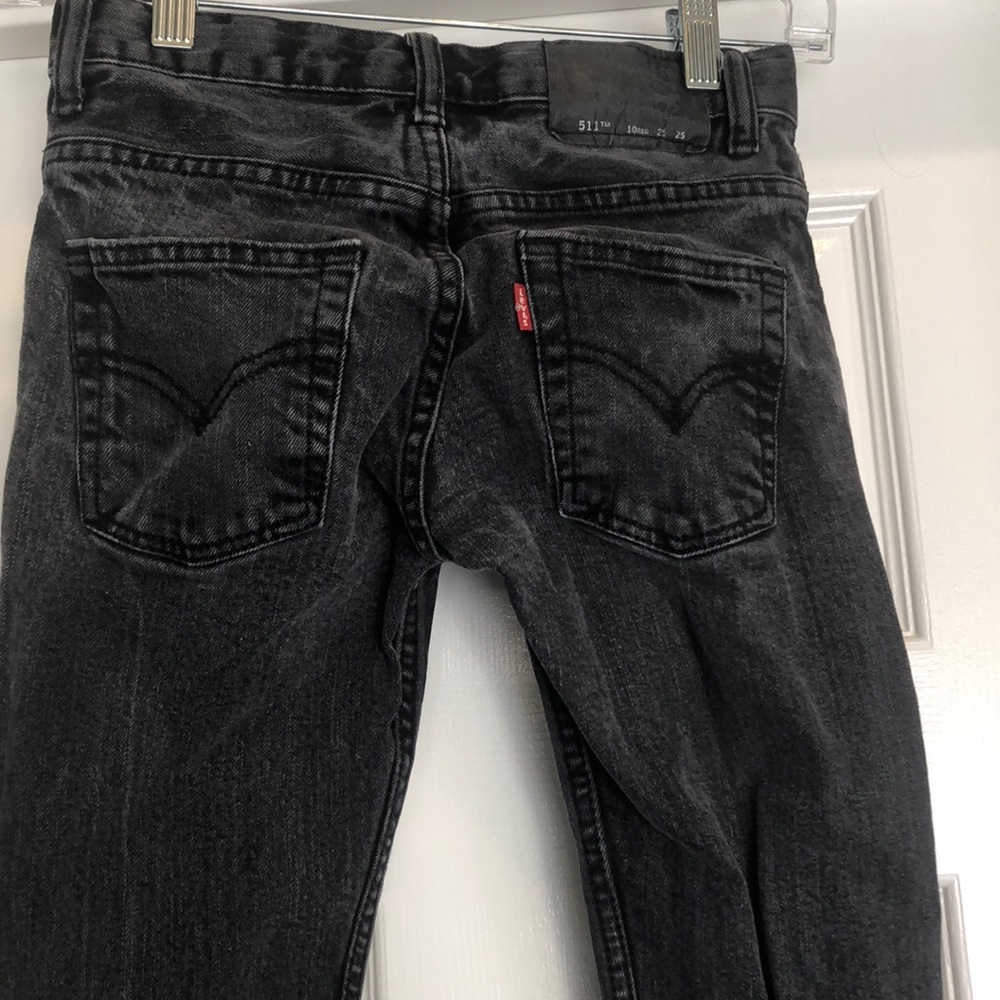 Faded, black 511 Levi’s Jeans